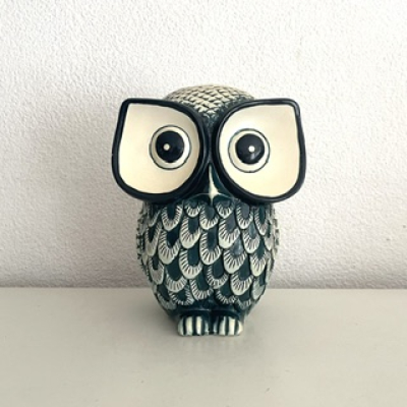 Blue white owl statue