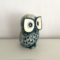 Blue white owl statue