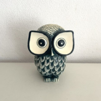 Blue white owl statue