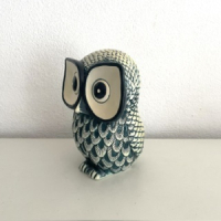 Blue white owl statue
