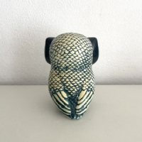 Blue white owl statue