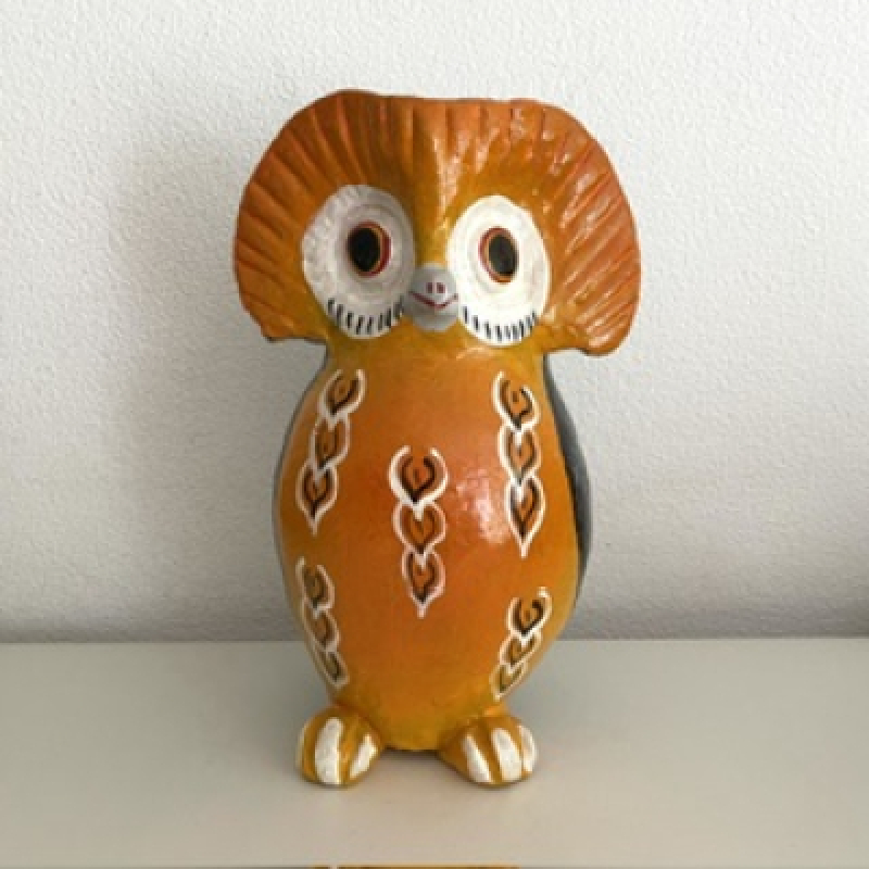 Orange yellow owl statue