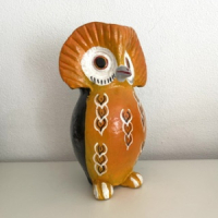 Orange yellow owl statue