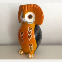 Orange yellow owl statue