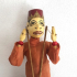 Wayang doll red hat