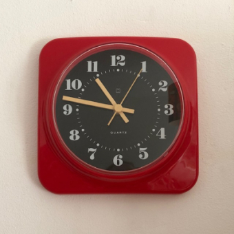 Hema red wall clock