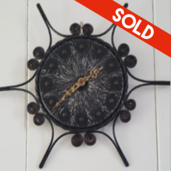 Wrought iron clock