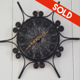 Wrought iron clock