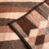 Bruine Tric Trac decor deken
