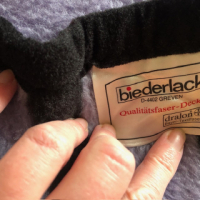 Paars geblokte deken