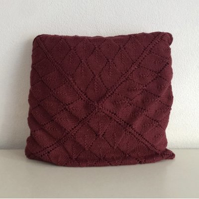 Purple knitted pillow