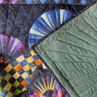Patchwork sprei wandkleed
