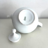 Roze paarse bloemen theepot