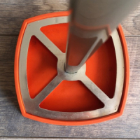 Orange umbrella stand - space age