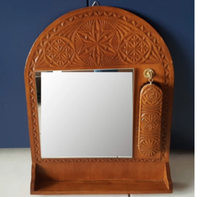 Boho mirror with clothes brush