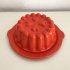 Orange ceramic pudding mold