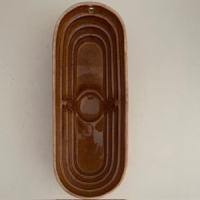 Bruine keramische puddingvorm