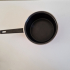 Brown saucepan with floral decor
