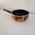 Bruin oranje steelpan met bloemen decor