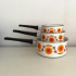 Orange flowers saucepans 