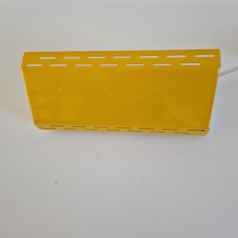 Geel bedlampje met sleufjes