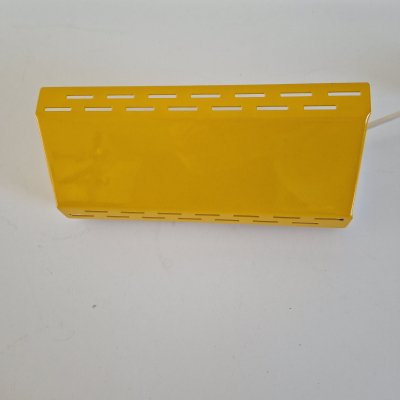 Geel bedlampje met sleufjes