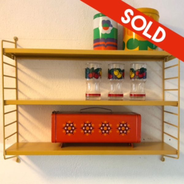 Yellow retro design shelving