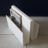 White plexiglass magazine holder