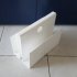 White plexiglass magazine holder