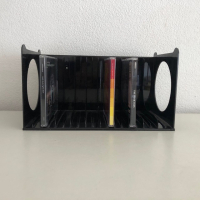 Black plastic CD rack