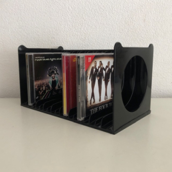Zwart plastik CD rek