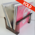 Brown plexiglass vinyl rack